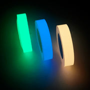Glow in the dark sticker tape roll glowing in low light, used for home decor, stairs, and DIY crafts.

