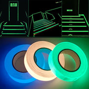 Glow in the dark sticker tape roll glowing in low light, used for home decor, stairs, and DIY crafts.

