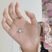 Elegant heart wings necklace featuring angel wings, symbolizing love, protection, and spiritual connection.