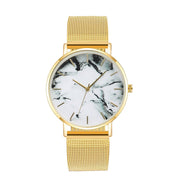 GFashion Rose Gold Mesh BFashion Rose Gold Mesh Band Creative Marble Female Wrist Watch Luxury Women Quartz Watches Gifts Relogio Feminino Drop Shippingand Creative Marble Women’s Quartz Wrist Watch, a luxurious and elegant accessory with a unique marble dial for women.