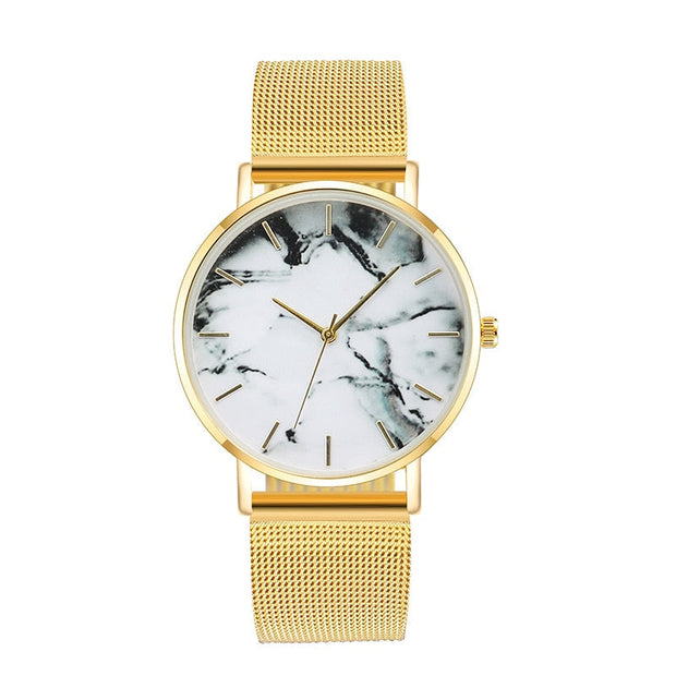 GFashion Rose Gold Mesh BFashion Rose Gold Mesh Band Creative Marble Female Wrist Watch Luxury Women Quartz Watches Gifts Relogio Feminino Drop Shippingand Creative Marble Women’s Quartz Wrist Watch, a luxurious and elegant accessory with a unique marble dial for women.