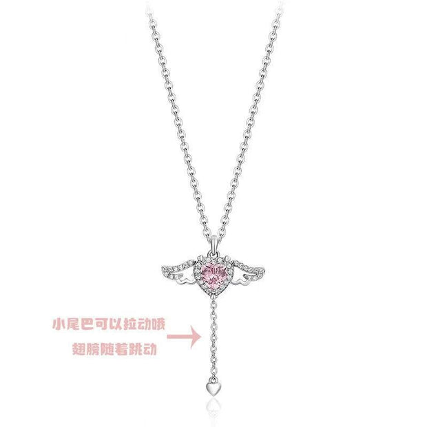 Elegant heart wings necklace featuring angel wings, symbolizing love, protection, and spiritual connection.