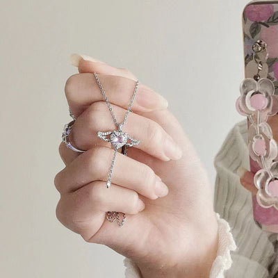 Elegant heart wings necklace featuring angel wings, symbolizing love, protection, and spiritual connection.