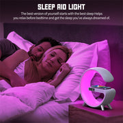 3-in-1 ampulla bedside lamp with Bluetooth speaker and wireless charger, ideal for nightstands and home offices.

