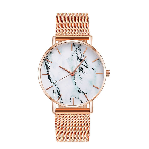 GFashion Rose Gold MesFashion Rose Gold Mesh Band Creative Marble Female Wrist Watch Luxury Women Quartz Watches Gifts Relogio Feminino Drop Shippingh Band Creative Marble Women’s Quartz Wrist Watch, a luxurious and elegant accessory with a unique marble dial for women.