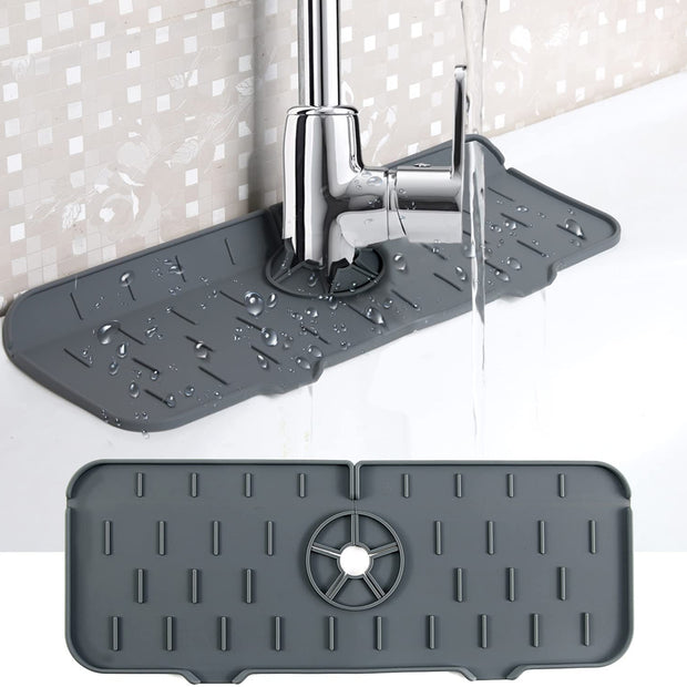 Silicone kitchen faucet mat placed around a sink faucet to prevent water splashes and keep the countertop dry