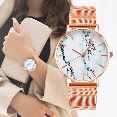 GFashion Fashion Rose Gold Mesh Band Creative Marble Female Wrist Watch Luxury Women Quartz Watches Gifts Relogio Feminino Drop ShippingRose Gold Mesh Band Creative Marble Women’s Quartz Wrist Watch, a luxurious and elegant accessory with a unique marble dial for women.